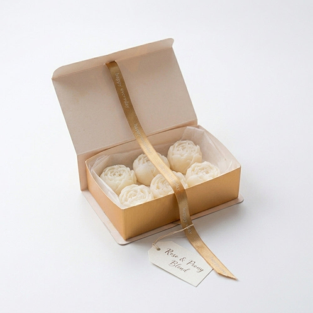 Velas aromáticas rosas frescas