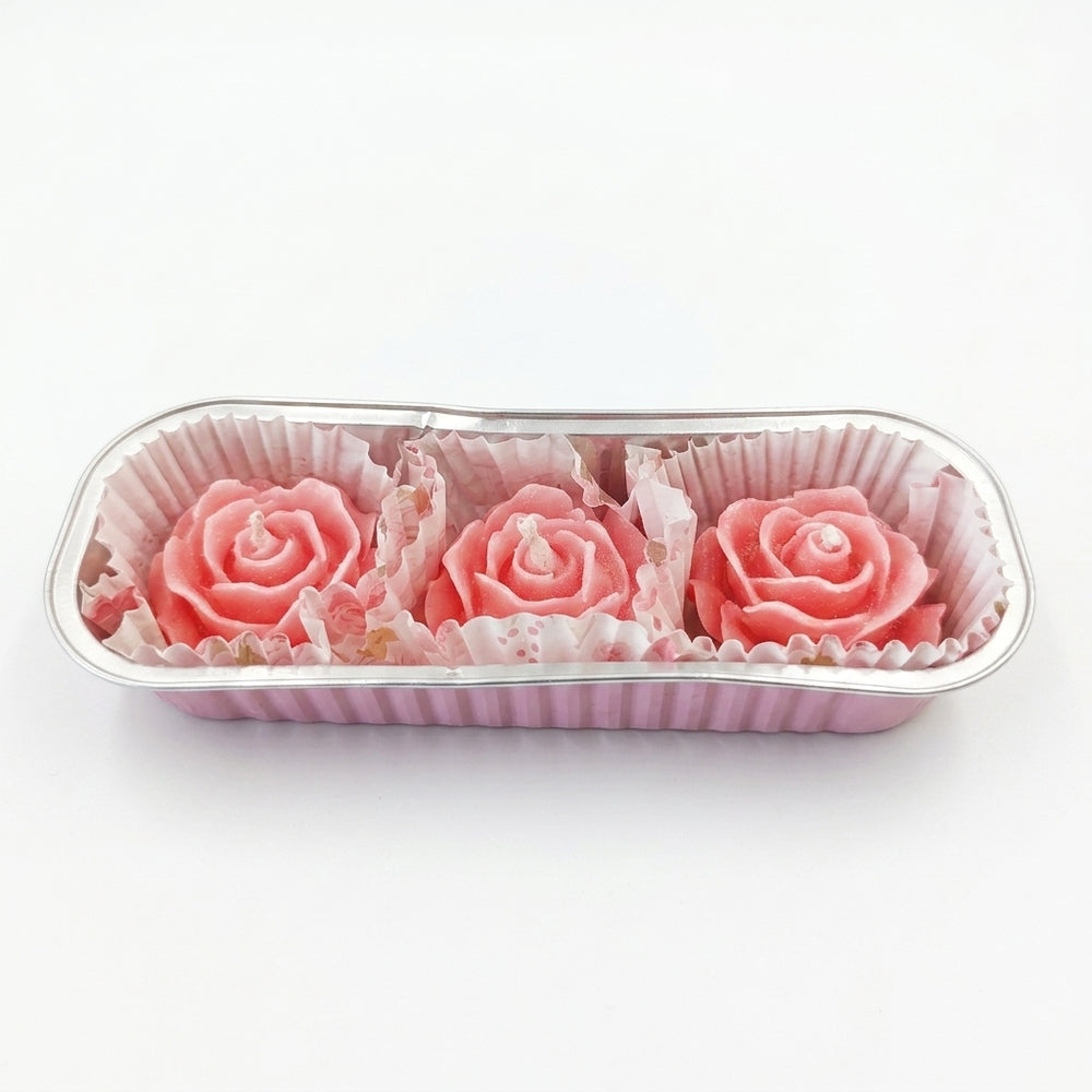 Velas en forma de rosas 3 pzas aroma rosas frescas.
